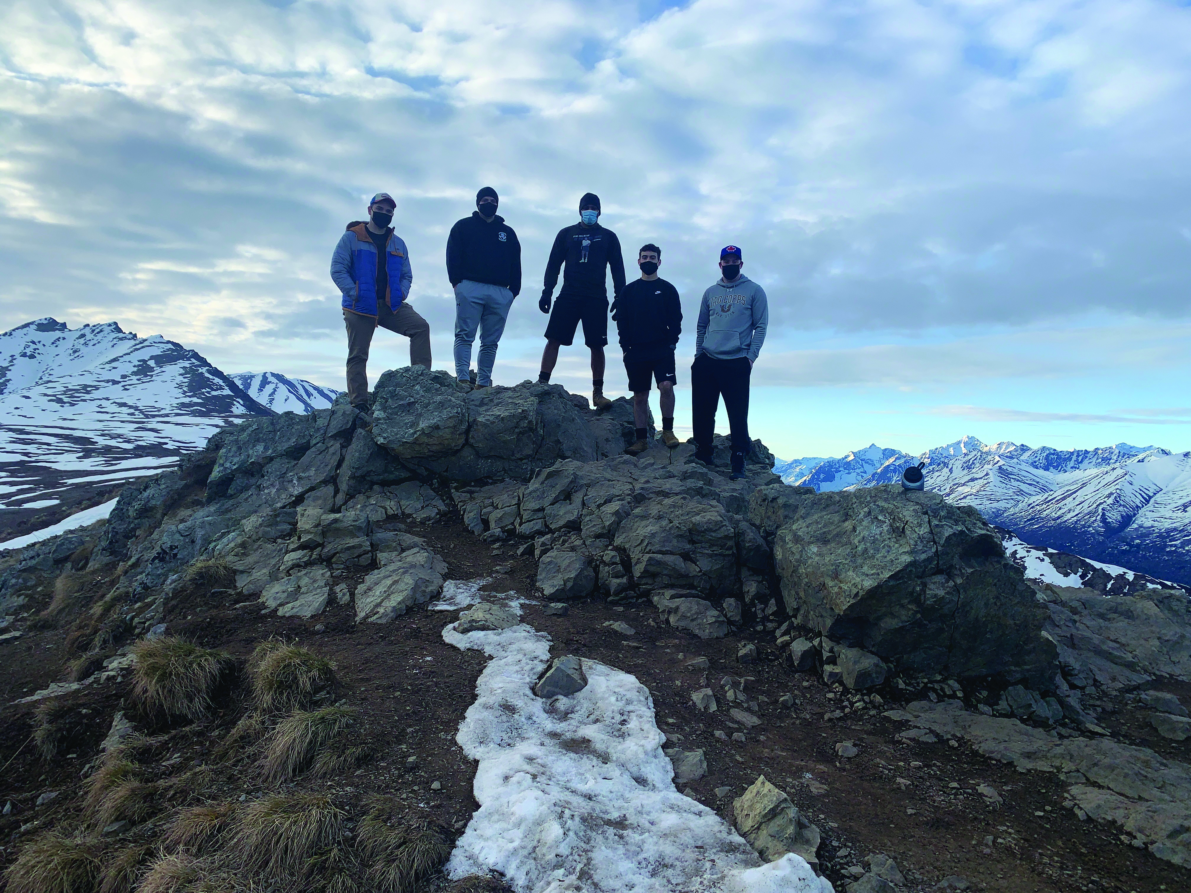 On 12 May 2021, the Spartan Brigade Legal Team hiked Mt. Baldy in the “warm” 33-degree weather in Anchorage, Alaska. Pictured from L to R: CPT Weston Harlan (MJA), SGT Robert Perkins (6th BEB Paralegal), SSG Desmond Bradley (Senior Paralegal), PFC Amado Delgado (1-40th CAV Paralegal), SGT Kyle Custer-Jones (725th BSB Paralegal). 